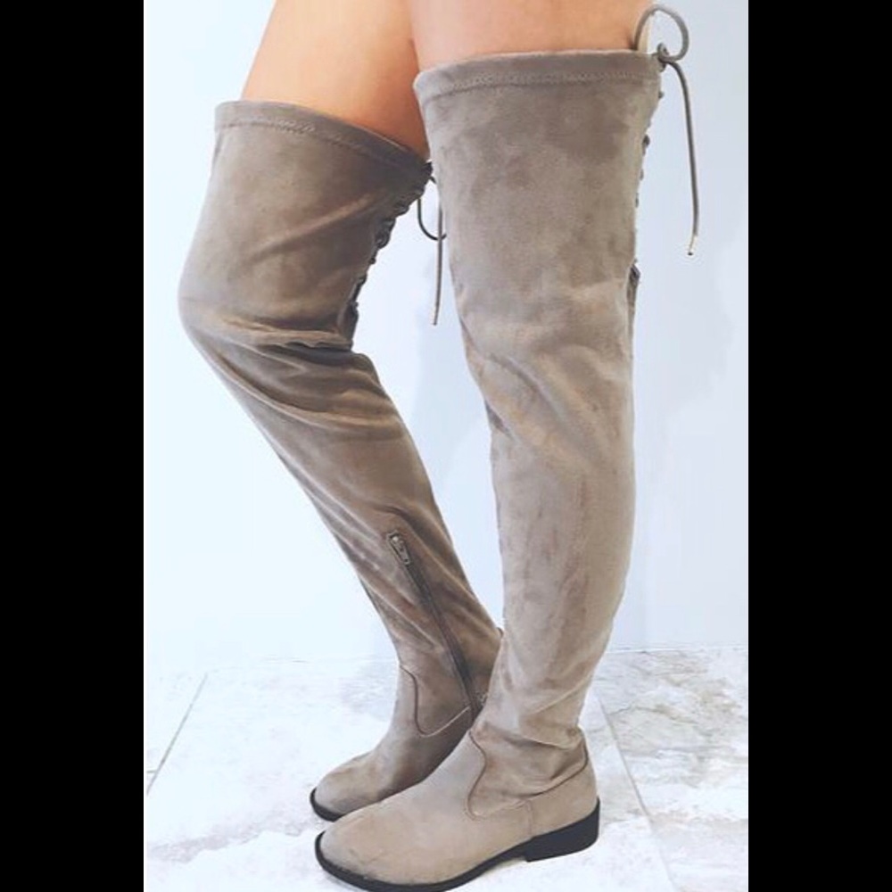 Never worn over the knee gray boots